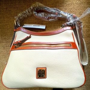 Dooney & Bourke Pebble Grain Piper. COLOR-bone, NWT and original packaging
